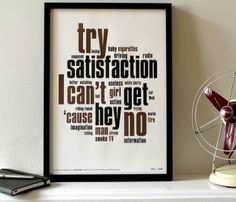 a framed poster with the words try satisfaction, i can't get cause they no