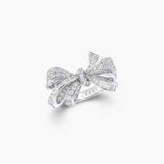 Discover the diamond bow ring depicting a lively bow motif from the Bow jewellery collection at Graff. Enter a world of perfection and beauty. Elegant Baguette Diamond Rings For Evening, Elegant Evening Rings With Baguette Diamonds, Elegant Baguette Diamond Rings For Party, Luxury Silver Jewelry With Bow, Luxury Silver Jewelry With Bow Detail, White Gold Bow Rings For Wedding, Elegant Diamond Rings With Bow Detail, Elegant Bow Ring, Diamond Ring With Bow For Gift