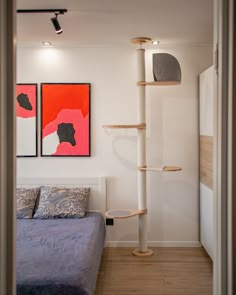 a bedroom with a cat tree in the corner