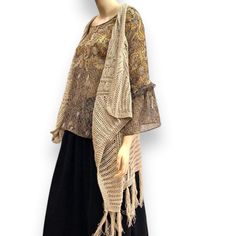 A Crocheted Beige Boho Kimono! A Long Open Front With Flowing Fringed Asymmetric Fringe Trim Duster Vest! Lightweight Perfect Year Round Layering Must Have! Measures Approximately One Size 34-39” Chest Material: 100% Acrylic Model: 5'11" Upc198179910 Bohemian, Prairiecore, Farmcore, Fairycore, Fall Fashion, Spring Attire, Outerwear, Layering, Y2k, Boho, Western, Gypsy, Hippie, Retro Chic, Tribal, Ethnic, Bts, Monochromatic, And More Fashion Styles! Open Front Can Be A Size Large Too! Depends On Beige Crochet Top For Fall Vacation, Brown Bohemian Open Knit Crochet Top, Bohemian Brown Open Knit Crochet Top, Beige One-size Crochet Top, One Size Beige Crochet Top, Layering Y2k, Fitted Peplum Top, Spring Attire, Duster Vest