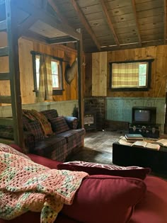 a living room filled with furniture and a fire place