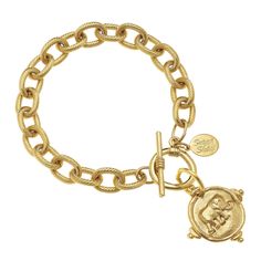 Inspired by the symbolic power and wisdom of the majestic elephant, the Gold Elephant Intaglio Chain Bracelet is the perfect addition to your bracelet stack. The elephant motif is displayed on a gold intaglio setting which dangles from our ever-popular chain bracelet and toggle clasp setting. Add this piece to your collection for an elegant reminder of individual beauty and the power of positivity. Horseshoe Necklace Gold, Equestrian Necklace, Susan Shaw, Pearl Chain Necklace, Gold Elephant, Elephant Bracelet, Usa Jewelry, Horse Necklace, Toggle Necklace