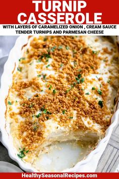 a casserole with layers of caramelized onion, creme sauce and tender turns and parmesan cheese