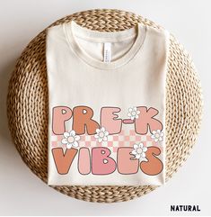 Pre-K Vibes Shirt, Pre K Teacher Shirts, Pre-K Crew Shirts, Back to School Shirt, Retro Pre-K Tee, PreK Squad,  Kids First Day of Pre K Tee More Grades and Styles Here: https://www.etsy.com/shop/TheGraphicPeach?ref=seller-platform-mcnav§ion_id=34195008 For environmental and human friendly reason, this product is only made when you order. Turnaround time is usually 1-5 business days before shipping, but can increase during holiday periods. Our professional printers always strive to ship as quickl Prek Squad Shirt, First Day Of School Outfit Pre K, Pre K Outfits Girls Back To School, Teacher Outfits First Day Of School, Prek Shirts For Teachers, Retro Teacher Shirts, Prek Teacher Shirts Designs, Preschool Tshirt Ideas, First Day Of School Teacher Shirt