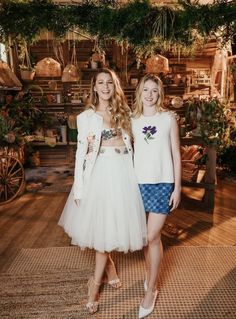 two young women standing next to each other