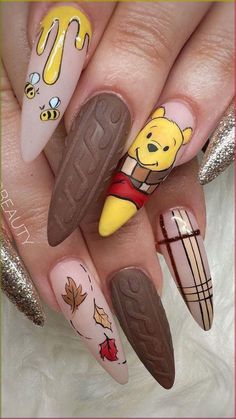 Step into the Easter vibe with these 21 fantastic nail designs! Whether it's adorable bunnies or vibrant eggs, we've got you covered to... Winnie The Pooh Fall Nails, Character Halloween Nails, Fall Nails Disney, Pooh Nail Art, Character Nails, Pink Nail Art Designs