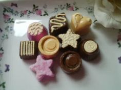 there are many different types of chocolates on the plate