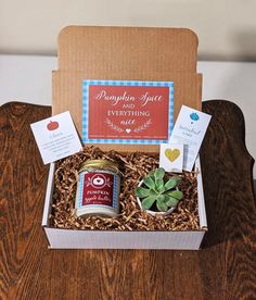 an open box with some food inside on a table