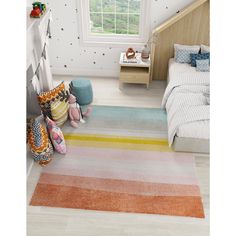 a child's room with a striped rug and toys