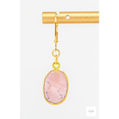 Behold these lovely gold-leafed pink Peruvian opal drop earrings! They exude understated elegance and add a modern feminine touch to your look. They are easily dressed up or down, and are perfect for any occasion. Beautiful, smooth, gold-leafed pink Peruvian opal bezels. These beautiful stones have natural patterns in shades for pink, grey, white, dusty rose pink coral pink, black and white. Gold-plated lever backs for a secure and comfortable fit. 1.75 inches longThese unique and beautiful earr Handmade Elegant Pink Opal Jewelry, Elegant Pink Opal Oval Jewelry, Elegant Gold Jewelry With Pink Opal, Elegant Handmade Pink Opal Jewelry, Single Opal Earring As A Gift, Elegant Opal Jewelry, Elegant Opal Jewelry With Natural Stones, Elegant Pink Opal Jewelry With Natural Stones, Elegant Pink Opal Jewelry Gift