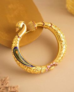 Elegant Gold Chandbalis With Peacock Design, Peacock Bajubandh Design Gold, Festive Gold Bangle With Peacock Design, Peacock Design Bangles Gold, Peacock Kada Designs Gold, Jewelry Hacks