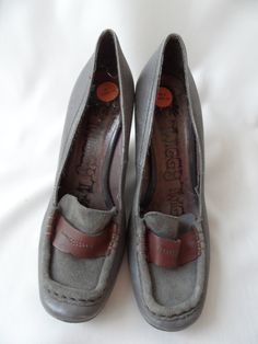 "Vtg Twiggy twiggy pumps in gray color with brown frontal ribbons. Wedges. Leather LOAFERS Wedges size 38 EU women leather, fancy, retro mod pumps. European quality elegant pumps. On the surface 2 materials - leather and suede. condition: used condition, without damages. sizes: EU 38 - labeled size. US 7 outsole length 27 cm / 10.5\" in heels height 9,5 cm/ 3.7\" in" Gray Leather Block Heel Shoes, Gray Leather Block Heels, Gray Leather Block Heel, Gray Leather Heels With Medium Width, Gray Leather Heels Medium Width, Gray Leather Heels With Round Toe, Gray Round Toe Heels For Work, Womens Leather Booties, Grey Wedges