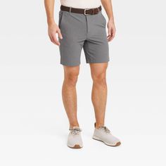 Why we're ALL IN: Solid-hued golf shorts are made with quick-dry fabric with moisture-wicking properties to help keep you cool and dry during golf, travel or leisurely walks. They're designed with 4-way stretch to help you move in absolute comfort, while the UPF 50+ rated material offers UV protection. They feature a belt-loop waistband with a fly zipper closure, while a zippered pocket plus side and back pockets complete the design with functional flair. All in Motion™: Made for every move, pri Moisture-wicking Athleisure Shorts For Golf, Sporty Golf Shorts With 4-way Stretch, Summer Golf Moisture-wicking Shorts, Solid Golf Bottoms With Built-in Shorts, Golf Bottoms With Built-in Shorts And 4-way Stretch, Walking Everyday, Golf Travel, D Gray, All In Motion