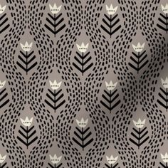 a black and white pattern with leaves on it