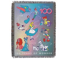 a blanket with cartoon characters on it and the words 100 years of wonder written in red