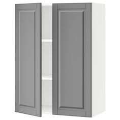 a white cabinet with two doors and shelves