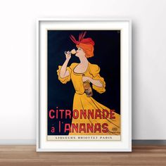 a woman in a yellow dress is drinking from a bottle with the words citronnade la'ananas on it