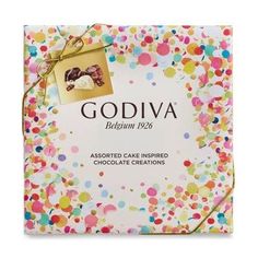 godiva cake in a gift box with confetti