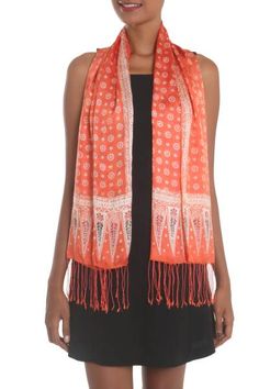 Associated with Javanese royalty traditional truntum motifs are realized in colors of tangerine and ivory to decorate the smooth silken body of this Majestic wrap scarf from Bali. Yuni Kristina employs the batik method drawing the starry motifs with a wax resist before applying colorful dyes. Long delicate fringes finish the scarf. Batik Scarf, Elegant Scarf, Spirit Clothing, Indonesian Batik, Fair Trade Clothing, Batik Art, Elegant Scarves, Wax Resist, Silk Shawl