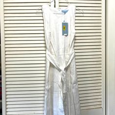 Antonio Melani Size:4 Worn Once After These Photos Were Taken Zipper Back Tie Belt Very Flattering Fit Bottoms Are A Wider Leg And Stop Just Above The Ankle White Fitted Linen Jumpsuit, White Fitted Jumpsuits And Rompers With Tie Waist, Fitted White Jumpsuits And Rompers With Tie Waist, White Fitted Jumpsuit With Tie Waist, White Jumpsuit, Antonio Melani, Tie Belt, Pant Jumpsuit, Wide Leg