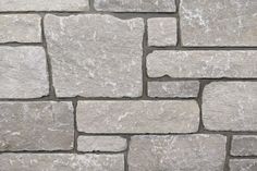 a close up view of a stone wall