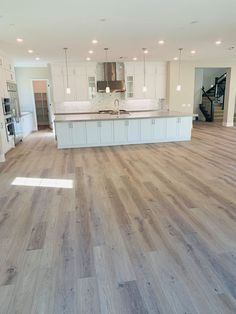 Provenza At Ease installed in a kitchen space, showing off warm but washed out coastal and driftwood charm Driftwood Lvp Flooring, Waterproof Vinyl Plank Flooring, Suite Bathroom