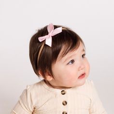 Dress your little one up with our satin bows! Handmade by local moms from high-quality satin. This is the perfect bow for your darling little girl! Each bow is hand tied and is attached to a nylon headband. All bows are secured so they do not come undone! Size:Small - 2.5 in x 1.5 inLarge - 3.5 in x 2 in Perfect Bow, Pink Headband, Pink Headbands, Newborn Essentials, Come Undone, Happy Mom, Small Bows, Large Bow, Satin Bow