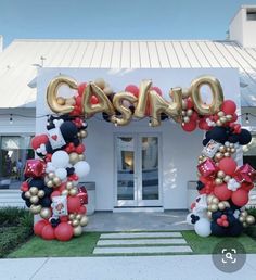 the entrance to casino is decorated with balloons