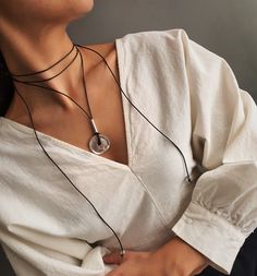 "Wrap leather choker, womens leather necklace, uno de 50 style, leather coin necklace, tie up bolo necklace, bohemian leather jewelry Welcome to my shop! 📌Please Kindly Note: The listing is for only one necklace! 📌It is made of genuine leather and Zamak metal parts, which have been immersed in 999o sterling silver twice! 📌It is subjected to an anti-allergic process (nickel and lead-free). 📌Many of our jewelry has been through an oxidation process. Therefore, some natural black marks or imper Bohemian Lariat Choker, Adjustable Cord Long Necklace, Minimalist Adjustable Choker, Trendy Adjustable Lariat Necklace For Everyday, Adjustable Trendy Lariat Necklace For Everyday, Adjustable Cord Choker For Festivals, Handmade Choker For Everyday Use, Adjustable Length Lariat Choker Necklace, Handmade Necklaces With Waxed Cord