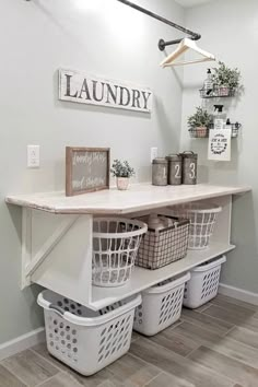 the laundry room is clean and ready to be used as a storage area for clothes