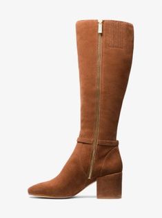 With a clean, classic silhouette and a slim buckled strap at the ankle, the Ella is the  wear-with-everything boot you’ve been looking for. Made from luxe suede, it features a wrapped block heel that extends the long line of the boot and keeps you walking tall day and night. Chic Heeled Boots With Buckle For Work, Chic Suede Knee-high Boots With Reinforced Heel, Luxury Heeled Boots With Buckle Closure For Fall, Luxury Heeled Boots With Buckle For Fall, Luxury Boots For Spring Workwear, Luxury Boots For Workwear In Spring, Chic Square Toe Boots With Suede Lining, Modern Suede Heeled Boots For Fall, Suede Boots With Buckle Closure For Work