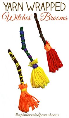 the yarn wrapped witches brooms are colorful