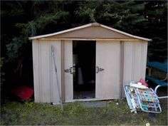 there is a small shed with doors open