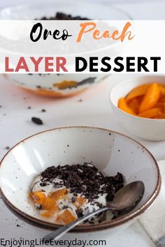 a bowl filled with oreo peach trifle on top of a white tablecloth