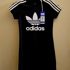 New With Tags, Girls Adidas Dress. It Is A Size 9-10. I Absolutely Love This Dress, Sporty Adidas Cotton Dress, Adidas Sporty Summer Dresses, Sporty Adidas Summer Dresses, Adidas Cotton Summer Dress, Adidas Cotton Dress For Summer, Adidas Black Summer Dresses, Summer Cotton Adidas Dress, Summer Cotton Dress By Adidas, Adidas White Dress For Spring