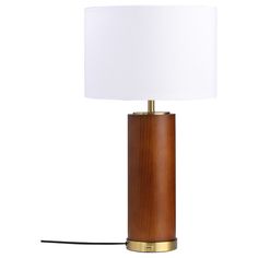 a wooden table lamp with a white shade on the top and a black cord attached to it