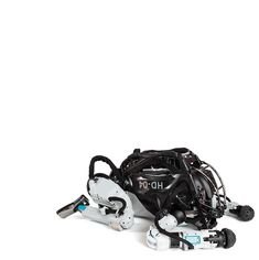 the robot is laying on its side next to it's harness and headphones