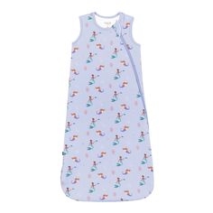 a sleeping bag with mermaids and stars on the front, in lavender blue fabric