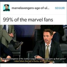 a man in a suit and tie sitting next to another man on a chair with the caption 99 % of the marvel fans