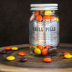 a jar filled with candy corn and jelly beans