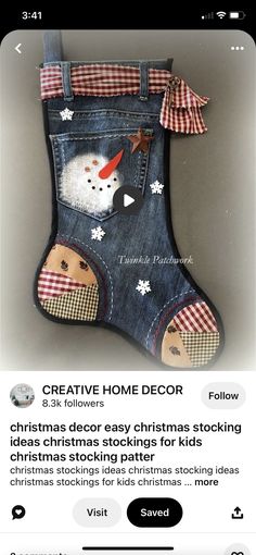 a christmas stocking with a snowman in the pocket is featured on instagram