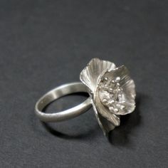 Silver Flower-shaped Diamond Ring, Elegant Silver Flower-shaped Diamond Ring, Elegant Wedding Rings With Flower Shape, Elegant Silver Flower Diamond Ring, Elegant Flower Shaped Wedding Rings, Delicate Flower Ring With Rose Cut Diamonds For Wedding, Elegant Silver Flower Ring For Wedding, Silver Flower Shaped Diamond Ring, Delicate Sterling Silver Diamond Wedding Ring