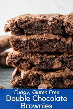 fudge, gluten free double chocolate brownies stacked on top of each other