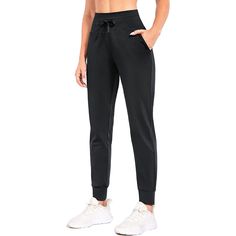 Stay warm and protected from the elements with our Women's Fleece Lined Pants. These water-resistant thermal joggers are perfect for winter running, hiking, and even just lounging around at home. The fleece lining will keep you cozy and comfortable, while the water-resistant material will keep you dry in light rain or snow. The pockets are perfect for storing your phone, keys, or other essentials while you're on the go. These sweatpants are perfect for any outdoor activity and are sure to become Sportswear Sweatpants With Side Pockets For Outdoor Activities, Relaxed Fit Joggers For Outdoor Activities, Solid Color Athletic Pants For Outdoor Activities, Athleisure Joggers With Pockets For Outdoor Activities, Relaxed Fit Sportswear Joggers For Outdoor Activities, Relaxed Fit Sportswear Joggers For Outdoor, Relaxed Fit Sportswear Pants For Outdoor Activities, Sporty Cargo Pants With Comfort Waistband For Outdoor, Sportswear Bottoms With Pockets And Midweight Fit