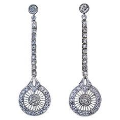 A pair of stylish 1920s Art Deco vintage long earrings handcrafted in platinum topped 18K gold and set with sparkling old cut diamonds. Estimated total diamond weight 3 carats. The earrings are marked with maker’s mark and initials. Length 50 mm (almost 2 in.) Earrings Multiple, Yellow Gold Diamond Earrings, Bling Earrings, Platinum Earrings, Stylish Art, Gold Dangle Earrings, 1920s Art, Earrings Diamond, Art Deco Stil