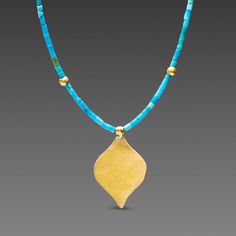 A graceful hammered 22k gold charm is suspended from a delicate strand of vibrant turquoise heishi beads, and accented with 22k gold beads. 14k gold clasp. Matte finish. Also available with lapis or coral heishi beads. Artisan Turquoise Necklace With Polished Gold Beads, Artisan Gold Turquoise Necklace With Polished Beads, Turquoise Bead Necklaces, Heishi Beads, Turquoise Beads, Gold Charm, 22k Gold, Gold Beads, Bead Necklace