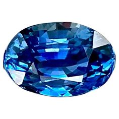 an oval blue diamond on a white background