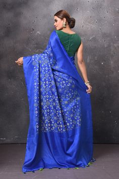 Radiate ethnic elegance on festive occasions in this royal blue printed patola saree. It comes with a matching blouse piece. Shop handloom sarees in USA from Pure Elegance. Disclaimer: The shown stitched blouse on the model is for display purpose only. The saree comes with a matching blouse piece and finished with fall and piko. Festive Blue Art Silk Pre-draped Saree, Blue Embroidered Pre-draped Saree For Transitional Season, Festive Blue Tussar Silk Pre-draped Saree, Blue Art Silk Pre-draped Saree With Traditional Patterns, Semi-stitched Royal Blue Saree, Eid Blue Raw Silk Pre-draped Saree, Festive Blue Handloom Pre-draped Saree, Blue Raw Silk Pre-draped Saree For Festivals, Blue Raw Silk Pre-draped Saree For Eid