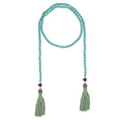 "Heidi Daus Tassel Tastic Lariat Turquoise Necklace Step up your style game with this fun and fabulous Beaded Crystal Cord Necklace. A single strand of smooth turquoise glass beads capped at each end with a coordinating luminous purple ribbed bead, and a crystal pavé station, with tassels that provide movement and interest to this unique necklace. Wear it open draped down your décolletage for an elongated silhouette, or loop it once around your neck for a choker-like style. * Various amounts &am Adjustable Green Beaded Lariat Necklace, Elegant Adjustable Tassel Necklace For Beach, Turquoise Beaded Tassel Necklace Gift, Adjustable Turquoise Tassel Necklace For Gift, Adjustable Turquoise Elegant Lariat Necklace, Elegant Turquoise Beaded Lariat Necklace, Turquoise Lariat Beaded Necklace With Colorful Beads, Adjustable Green Beaded Tassel Necklace, Turquoise Hand-strung Lariat Beaded Necklace