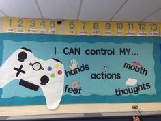 a classroom bulletin board with a video game controller on it's side and words that read i can control my hands, actions, feet, thoughs